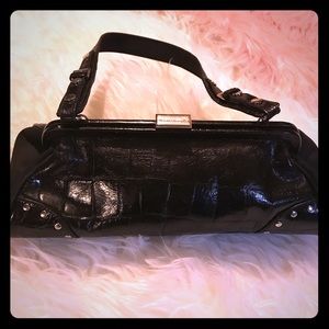Beautiful black Crock design Franco Sarto purse.
